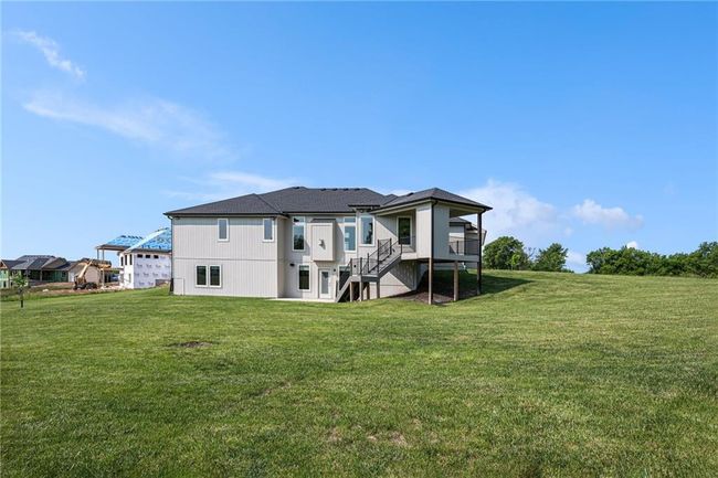 Back of house with stairs and a yard | Image 67