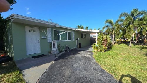 911 Ne 58th St, Oakland Park, FL, 33334-4130 | Card Image