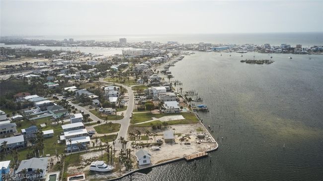 Aerial overview of property's location featuring a nearby body of water | Image 37
