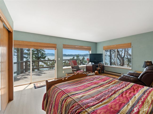 View from primary bed out to private deck. | Image 26
