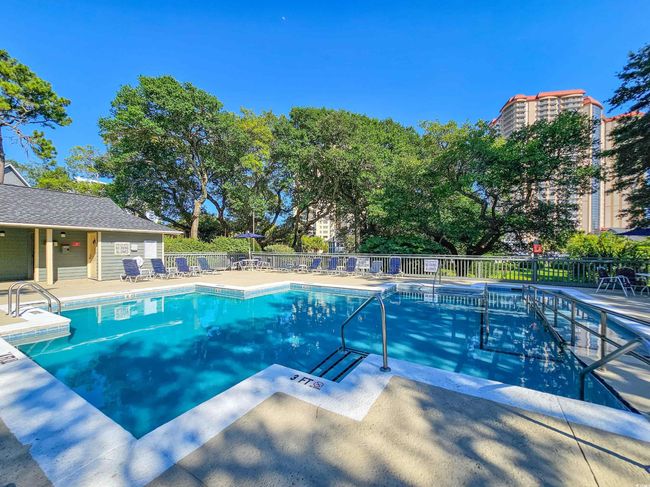 Community pool featuring a patio area | Image 36