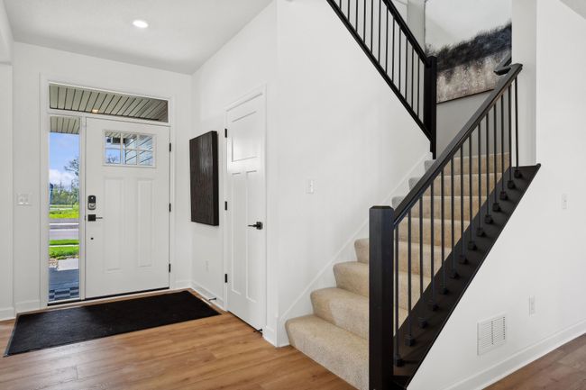 (Photo of a decorated model, actual homes finishes will vary) Make the best first impression with the bright and open foyer. | Image 9