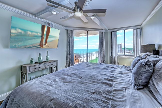 Bedroom featuring access to exterior, ceiling fan, and ornamental molding | Image 19