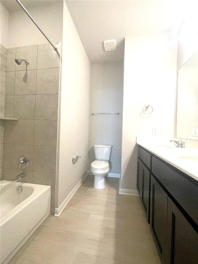 Full bath with shower / bath combination and double vanity | Image 16
