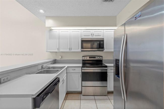 1903 Players Pl, Townhouse with 2 bedrooms, 2 bathrooms and null parking in North Lauderdale FL | Image 9