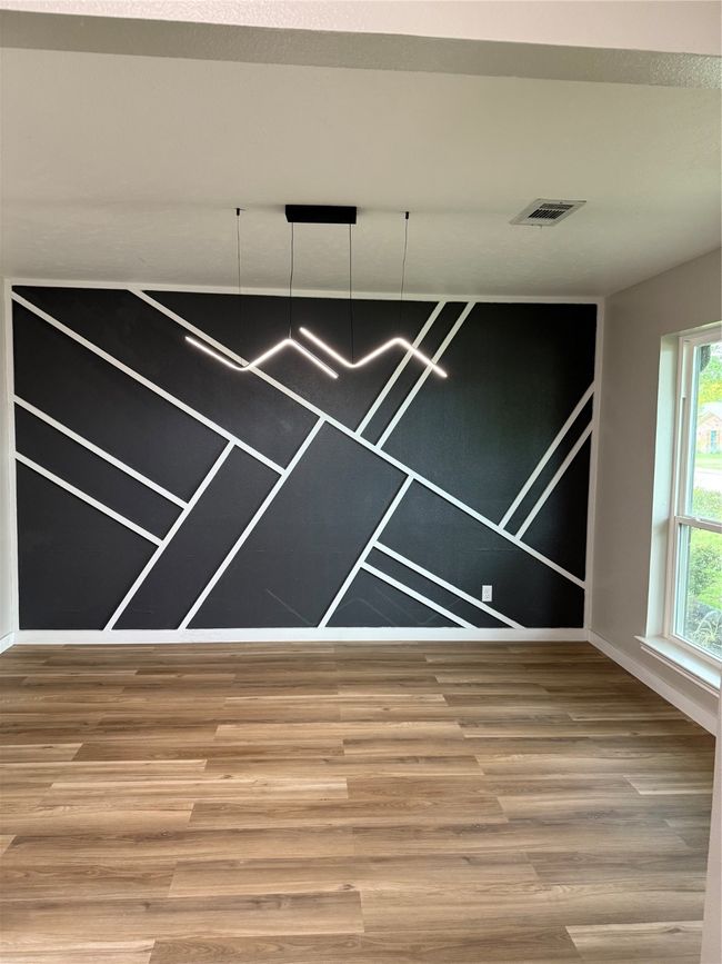 Entryway featuring baseboards and light wood-style floors | Image 4