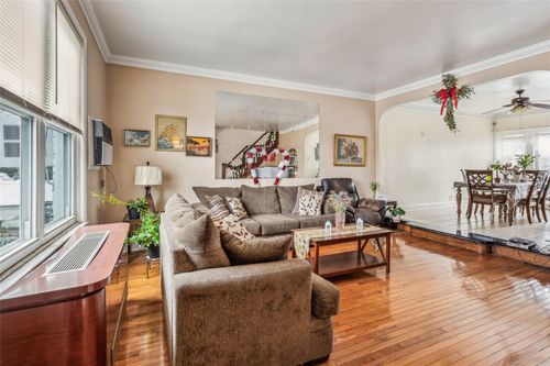 84 25th Ave, East Elmhurst, NY, 11370-1613 | Card Image