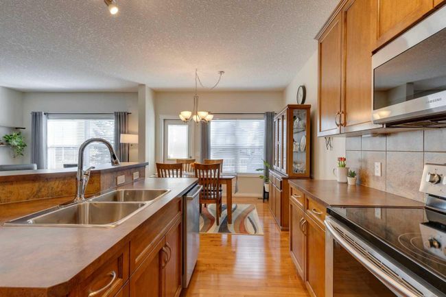 74 Kinlea Way Nw, Home with 3 bedrooms, 2 bathrooms and 4 parking in Calgary AB | Image 12