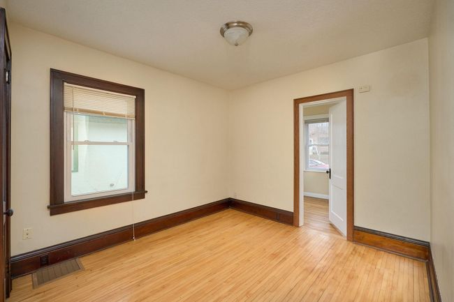 Main level bedroom 1 with bonus room | Image 18