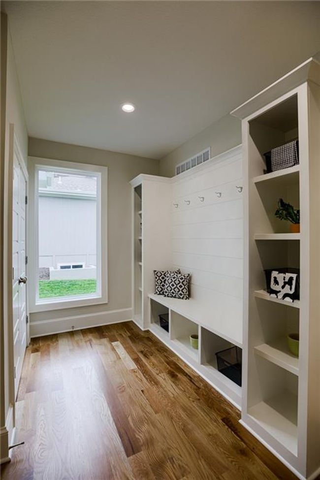 Mudroom featuring wood-type flooring | Image 20
