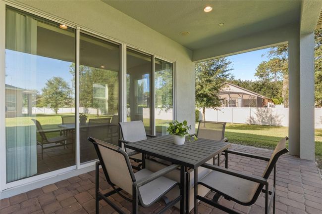 Back covered patio plumbed and wired for outdoor kitchen | Image 40