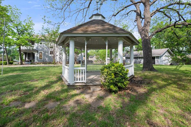 View of green lawn with a gazebo | Image 28