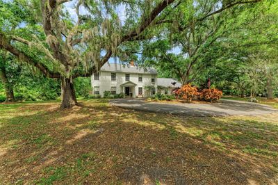 Welcome Home! Over 5 acres of privacy and so much potential | Image 1