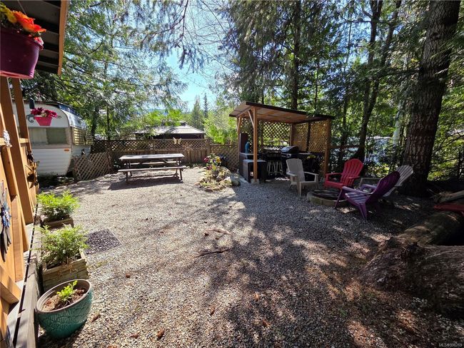 Fire Pit, and treed nook perfect for a swing in the hammock! | Image 4