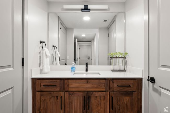 Bathroom with vanity | Image 40