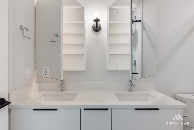 Bathroom with toilet and double vanity | Image 25