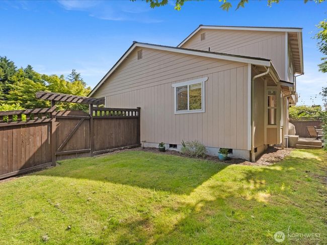 Fenced in back yard | Image 33