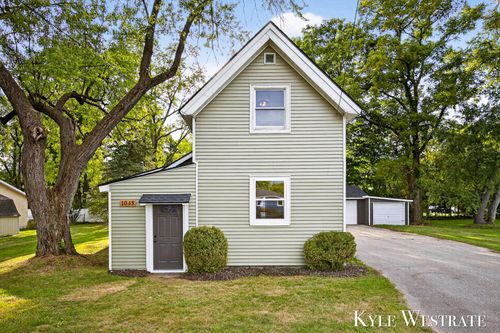 1048 Lincoln Lk, Lowell, MI, 49331-1016 | Card Image