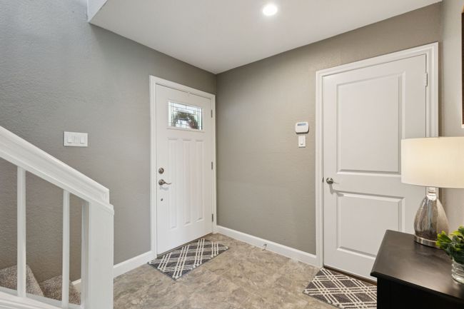 Foyer with baseboards and stairs | Image 4