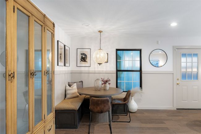 Dining area with breakfast area and dark hardwood / wood-style flooring | Image 14