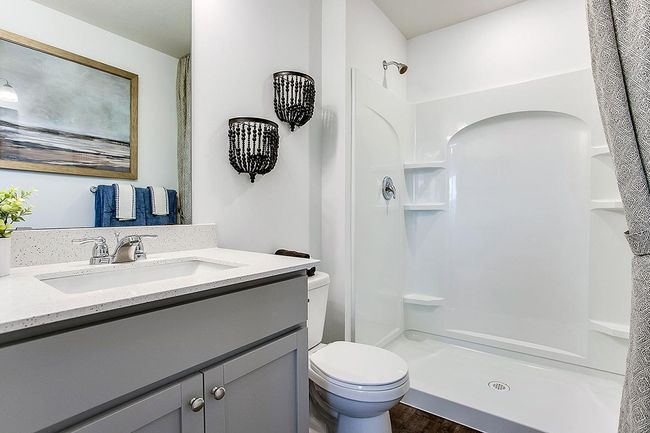 Attached bathroom to the primary suite. Model picture shown. Colors and finishes may vary. | Image 11