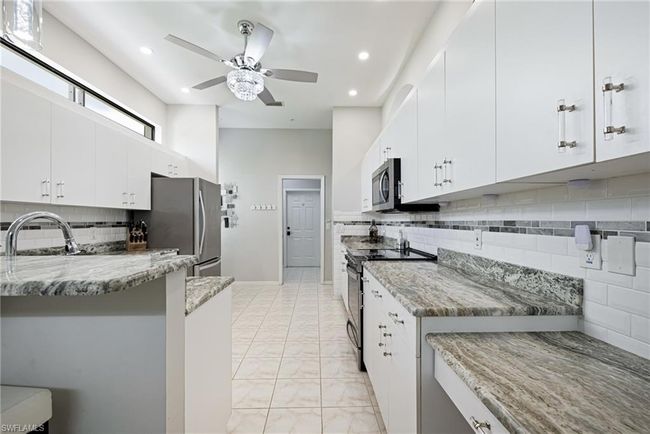 12802 Maiden Cane Ln, Condo with 3 bedrooms, 2 bathrooms and 2 parking in BONITA SPRINGS FL | Image 12