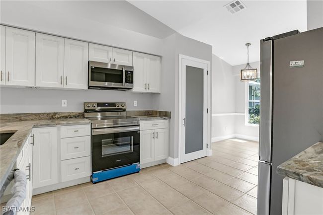 101 - 1660 Royal Cir, House attached with 3 bedrooms, 2 bathrooms and null parking in NAPLES FL | Image 9