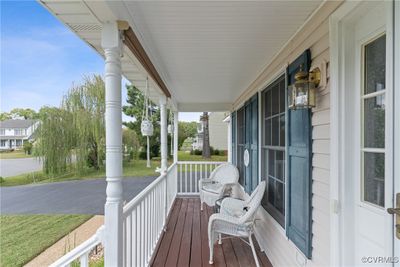 Wooden terrace featuring covered porch | Image 3