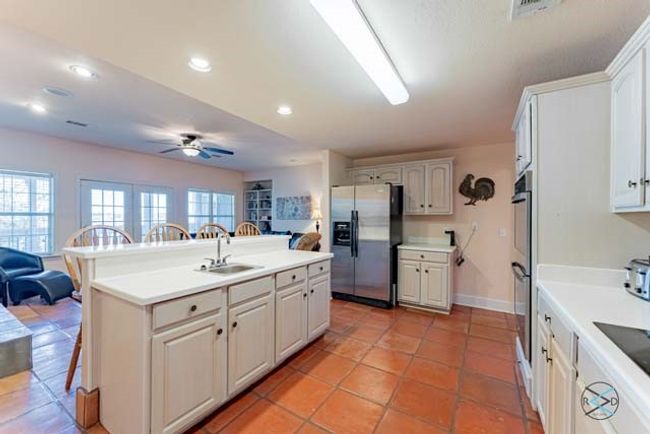 Kitchen is open to main living area making it easy to entertain family and friends. | Image 8