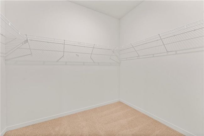 Located in Primary Suite | Image 15