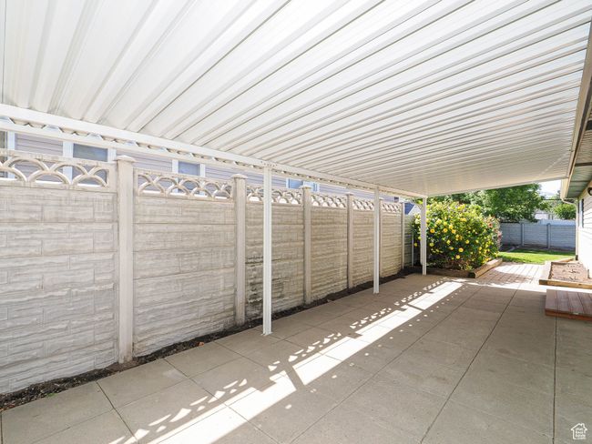 Fenced backyard featuring a patio | Image 32