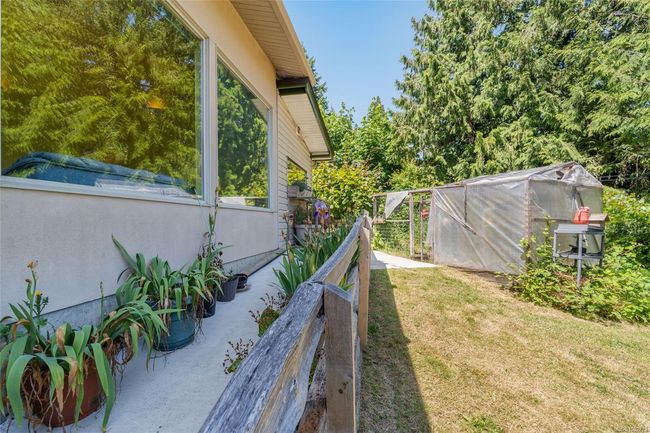 View of yard with an exterior structure and an outbuilding | Image 70