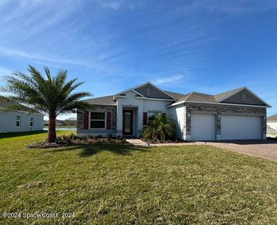 6215 Moonrise Drive, House other with 4 bedrooms, 3 bathrooms and null parking in Merritt Island FL | Image 1