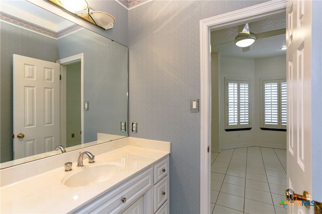 Private vanity inside Jack and Jill style bathroom inside third bedroom upstairs | Image 31