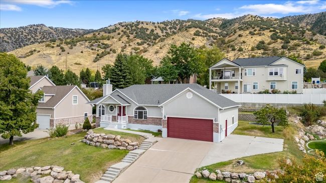 View of front facade with a front lawn and a mountain view | Image 45
