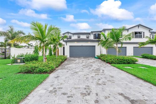 1-4973 Oakmont Dr, Fort Lauderdale, FL, 33312-5678 | Card Image