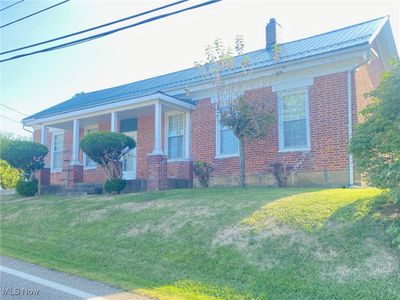 View of front of home with a front yard | Image 1