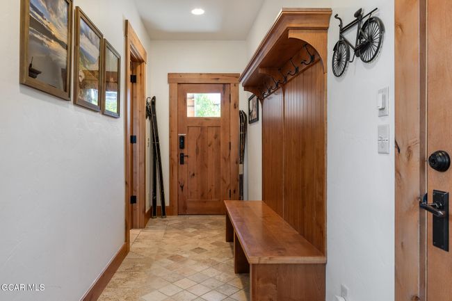 separate entry space with built in hall tree | Image 32