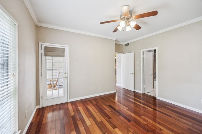 Primary bedroom with access to the covered patio | Image 17