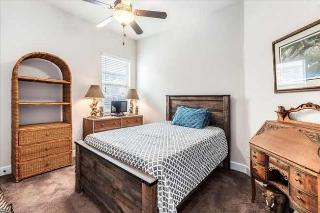 Bedroom featuring carpet and a ceiling fan | Image 23