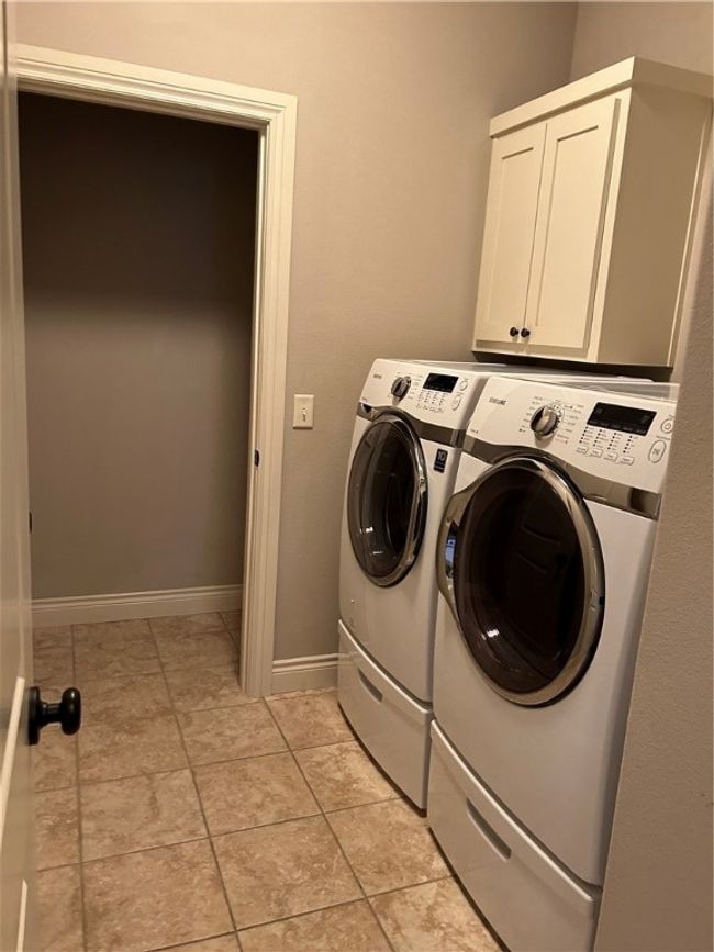 utility room to include washer and dryer | Image 19