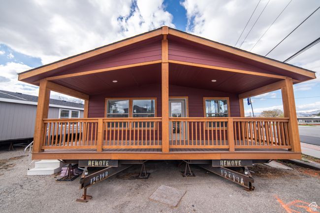 Back of property featuring a deck | Image 21