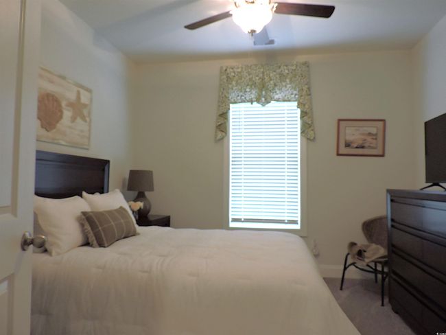 Bedroom with baseboards and ceiling fan | Image 29