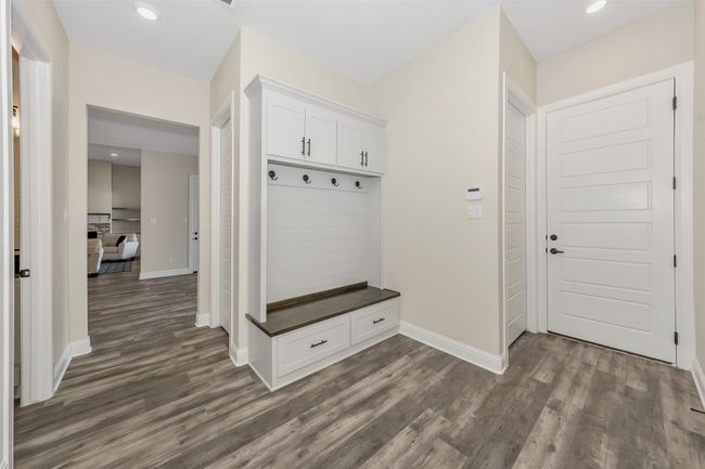 Mudroom with recessed lighting, baseboards, and dark wood-type flooring | Image 32