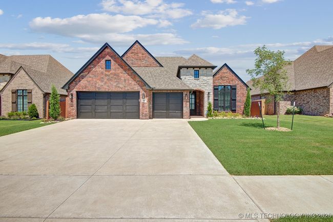 Beautifully maintained lawn and landscape w trees. | Image 4