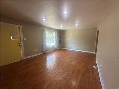 Unfurnished room featuring wood-type flooring | Image 3