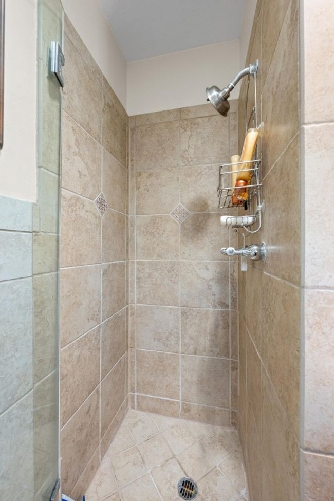 Bathroom featuring a stall shower | Image 17