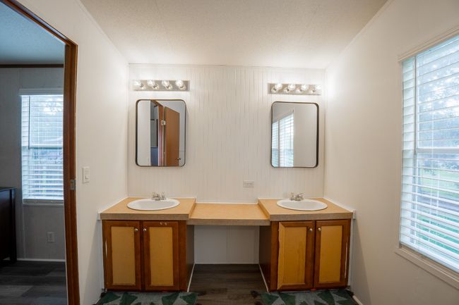 Full bathroom with vanity and wood finished floors | Image 19