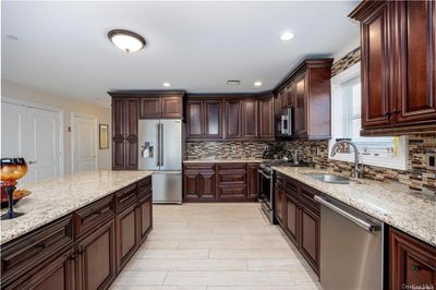 View of front property with a garage | Image 1