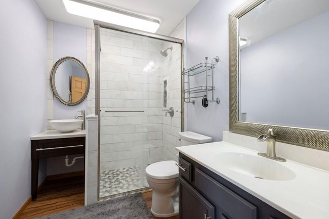 Dual vanities in private owner's bath | Image 21